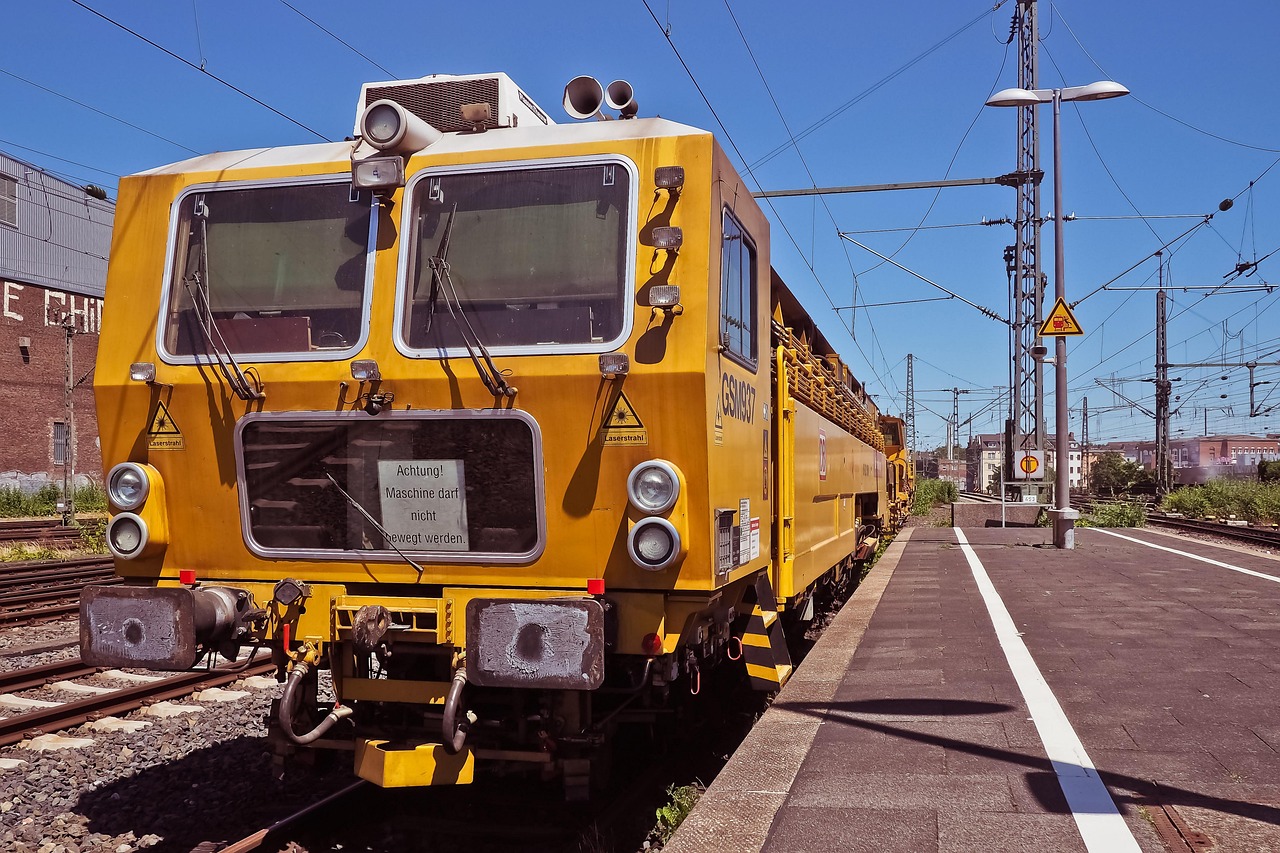 station, train, railroad, tracks, railroad track, platform, track construction machine, ballast levelling machine, track construction, track tamping machine, maintenance, railway line, railway tracks, railroad tracks, track bed, track reparaturzug